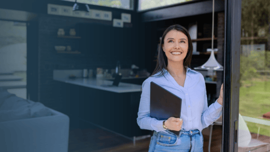 Female Appraiser Evaluating a Property