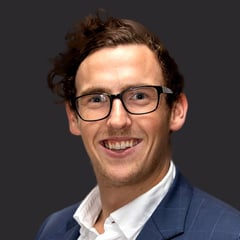 Headshot of Andrew Downie