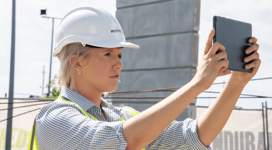 image of appraiser completing a 1004D final inspection on site