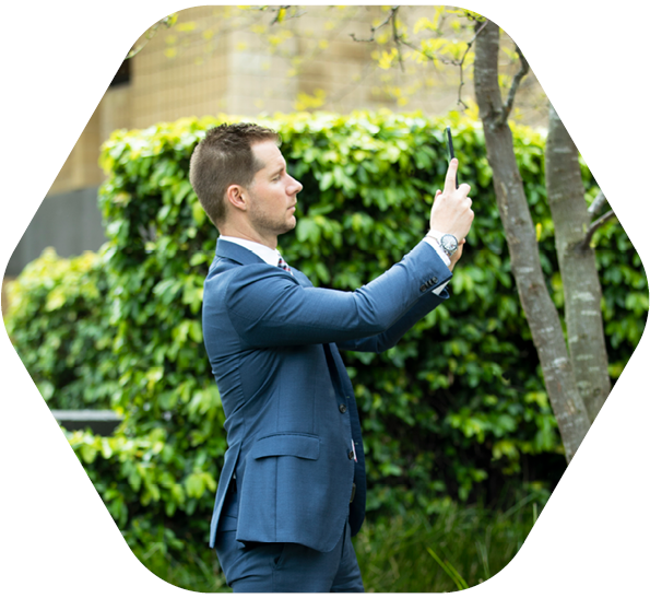 Opteon Employee Inspecting Property